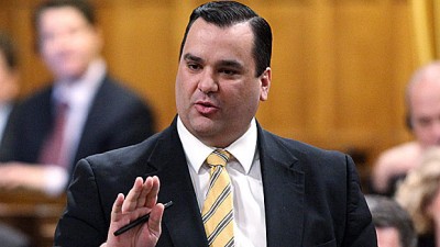 Honorable Minister James Moore, does he own a smartphone?