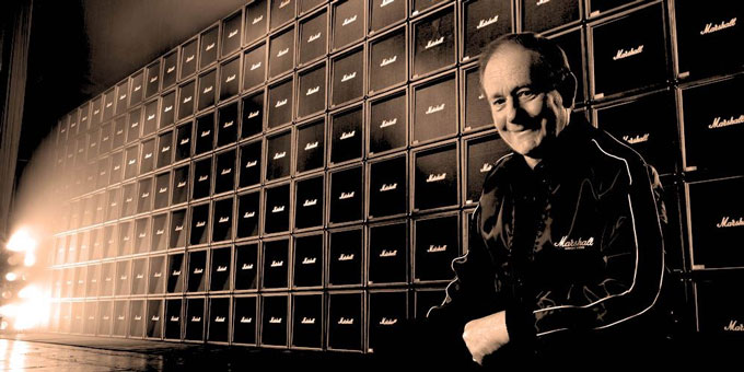 James Marshall and a wall of Marshall Amps (photo Marshall Amplifiers)