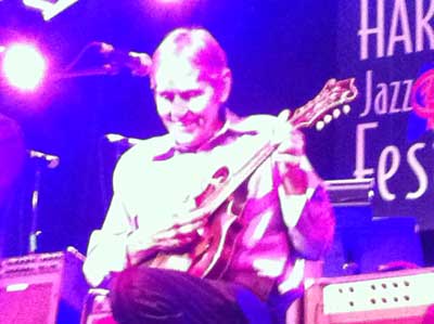 Levon Helm on mandolin at Harvest Blues and Jazz Festival 2011 (photo Stephen Pate)