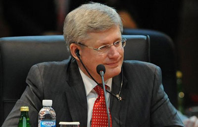 Canadian  Prime Minister Stephen Harper in Santiago Chile, not happy with our  Charter (Photograph by: SAUL LOEB , Getty Images Canada.com)