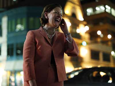 Alison Redford, Alberta Premier on the phone jubilant at election win(photo credit - Todd Korol / Reuters)