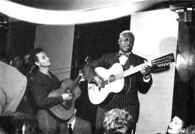 Woody Guthrie with a Martin 0-17 playing with Leadbelly, 1941 NYC